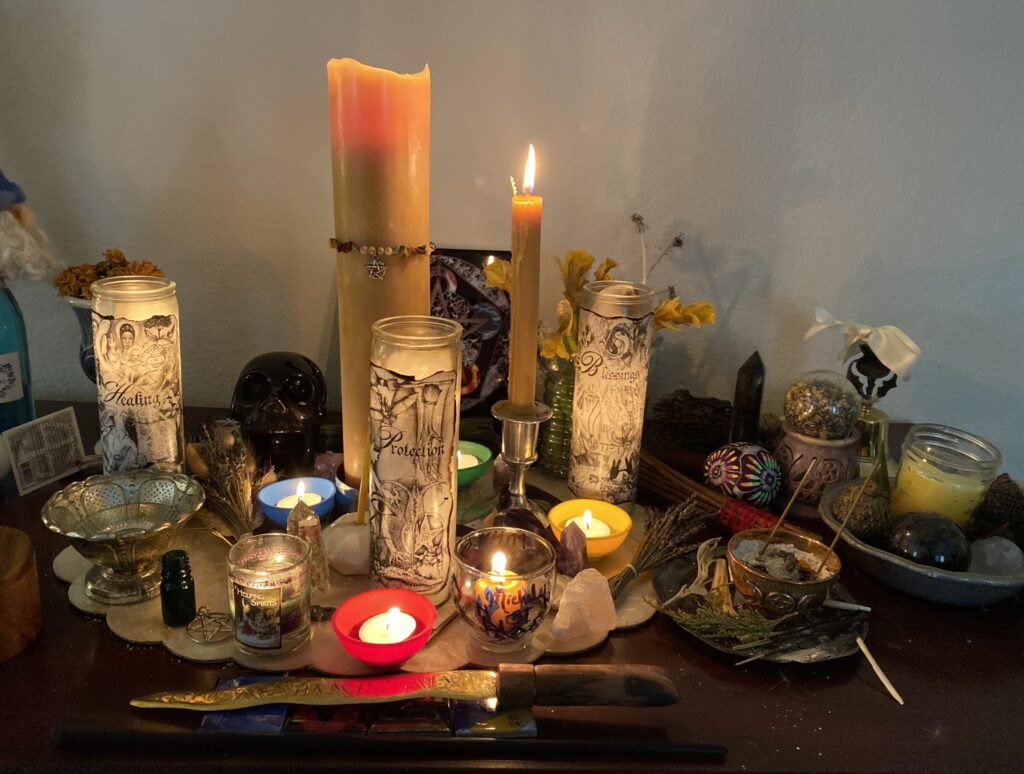 Altar with multiple candles lit